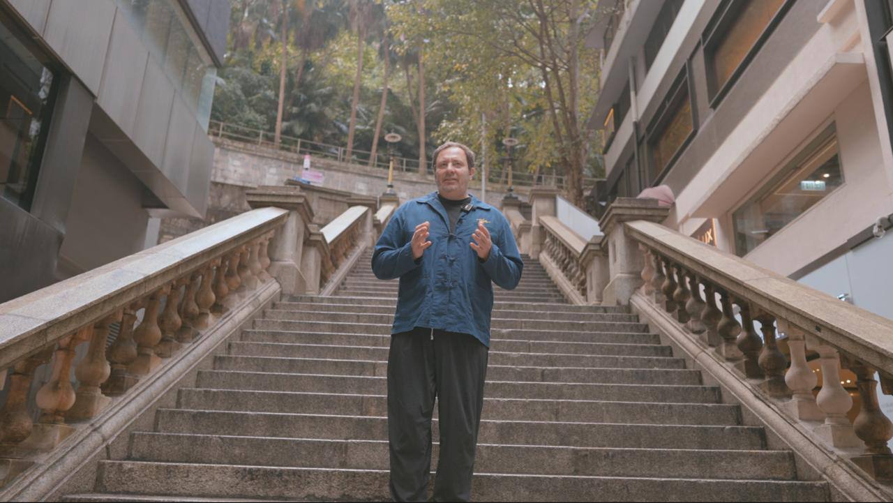 Sergei Minaev at the Central-Mid-Levels escalator